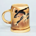 Mug — Attributed to Crescent Potteries (Figure with Staff)