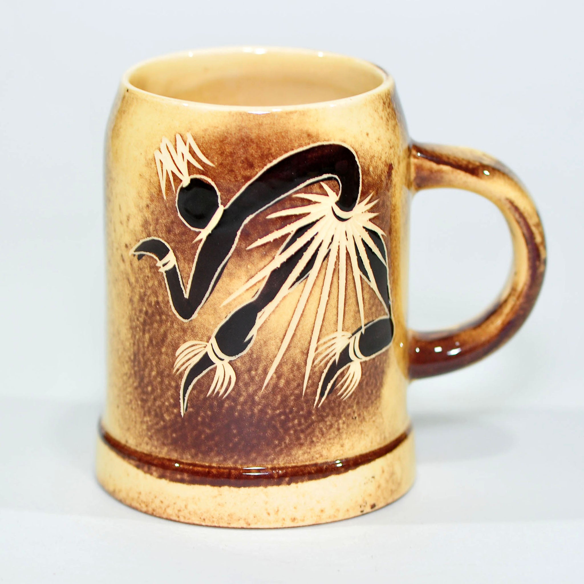 Mug — Attributed to Crescent Potteries (Figure with Staff)