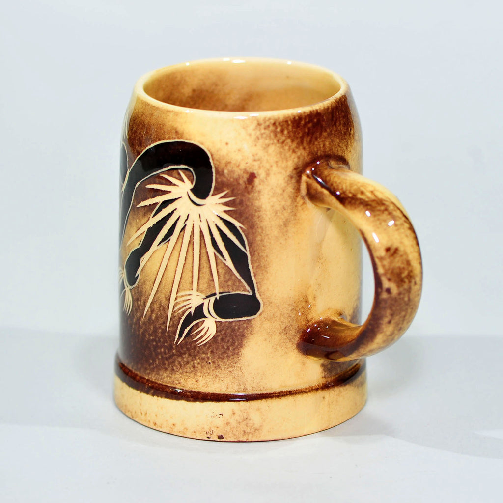 Mug — Attributed to Crescent Potteries (Figure with Staff)